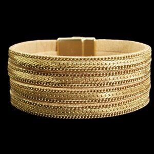 Wide gold chain bracelet with four rows of chain backed with a soft suede.